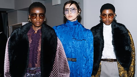 Three Models Pose Backstage at Gucci’s Cruise 2026 Collection