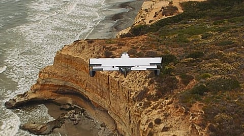 Pivotal Helix Flying Over Cliff and Sea