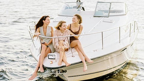 Three Women on a Speedboat Enjoying Themselves