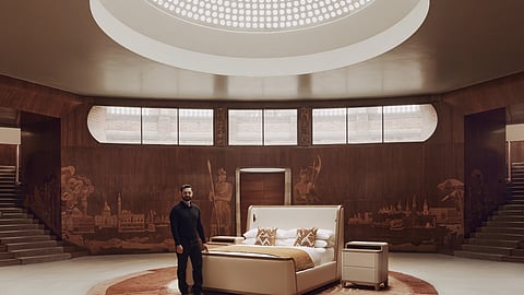 Michael Noah Poses with the Tranquility Bed at Eltham Palace