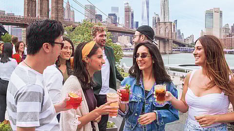 Toasting Cocktails Beneath the Brooklyn Bridge at Time Out Market New York