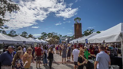 Crowd enjoying outdoor beer festival at Baytowne Wharf