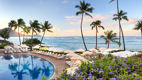 Halekulani’s Iconic Oceanfront Pool at Sunrise