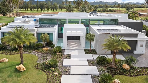 Contemporary luxury home in Dorado, Puerto Rico with golf course backdrop