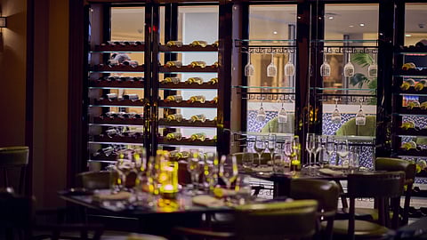 Warmly Lit Wine Room Sets The Scene For Refined Evenings