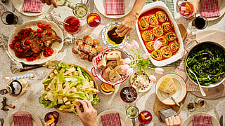 Shared table with seasonal dishes and wine at Platform by JBF