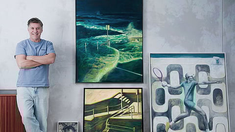 Andy Fackrell in his studio with tennis paintings