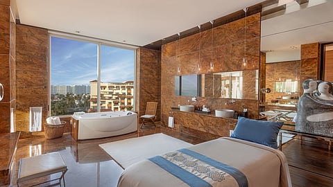 Spa suite with wellness bed and soaking tub at Grand Velas