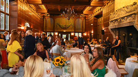 Guests pose together at ACE Sunflower Soirée in Southampton