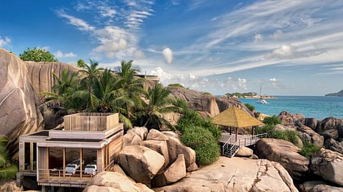 Luxury oceanfront villa built into granite rocks in Seychelles