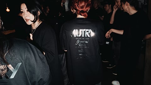 Guests wearing AUTRY x Maison Mihara Yasuhiro collaboration tees