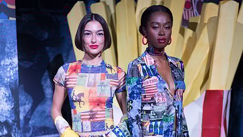 Two models in Americana print outfits on NYFW runway