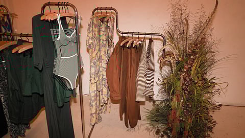 Clothing racks with ACACIA Spring 2026 pieces