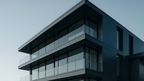 Sleek modern apartment building with glass balconies in Switzerland