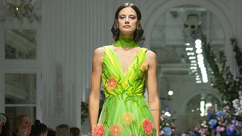 Green gown with pink floral details