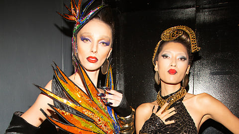 Models in bold couture backstage at The Blonds NYFW show