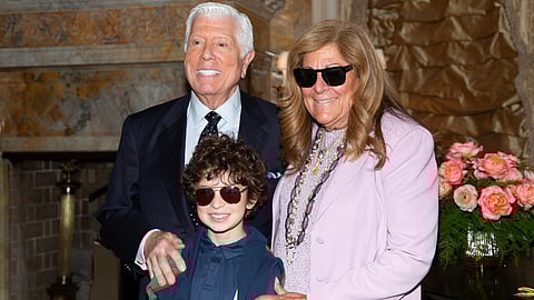 Dennis Basso poses with guests at his Spring/Summer 2026 NYFW show