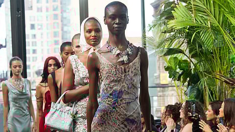 Models walk the finale at Janet Mandell New York Fashion Week
