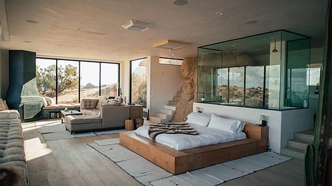 Modern luxury hotel suite with desert views