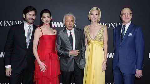 Anne Hathaway and Valentino Garavani at the 2025 WWD Honors