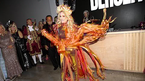 Leesa Rowland in a fiery sequined costume at “Midnight at the Met"