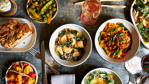 Assorted dishes, olives, and focaccia served at Troutbeck in Hudson Valley