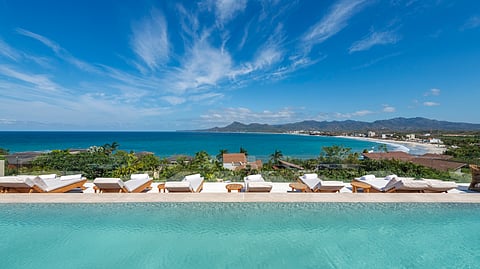 Infinity pool overlooking the Pacific Ocean and Punta Mita coastline