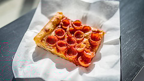 A slice of the Spicy Spring pepperoni square