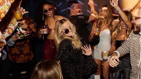 Guests dancing and celebrating on a lively night at Grey Lady