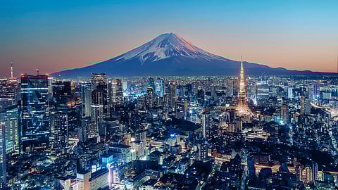 Tokyo skyline at sunset with Mount Fuji in the background