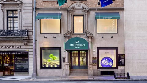 Exterior view of Maison Orveda’s Madison Avenue skincare maison with green awnings