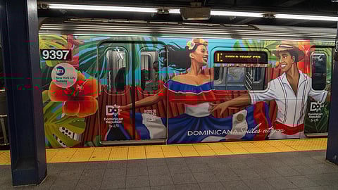 Colorful Dominican Republic artwork displayed on a New York City subway train