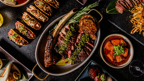 Bondi Sushi tablescape with sushi, robata steak, and shareable dishes at Bryant Park