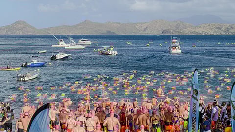Hundreds of open-water swimmers at the start of the Nevis to St. Kitts Cross Channel Swim