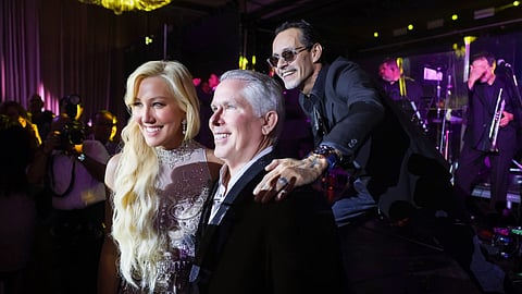 Dr Elena Alvarez Westwood and Thomas J Henry with Marc Anthony at their engagement celebration