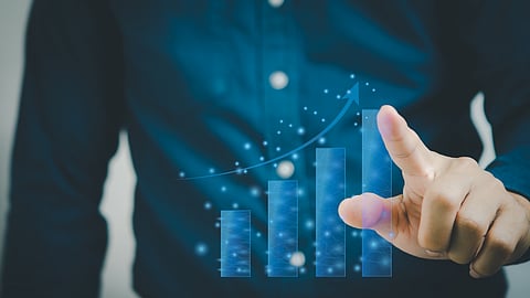Hand interacting with digital growth chart symbolizing SEO, search rankings, and growth