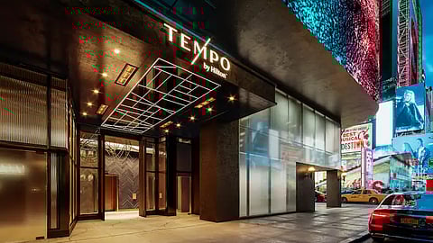 Entrance of Tempo by Hilton New York Times Square at night in Times Square