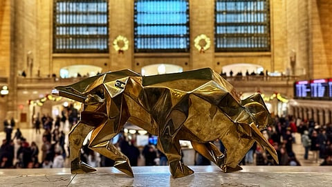 Gold-finished bull sculpture overlooking Grand Central Terminal’s Main Concourse
