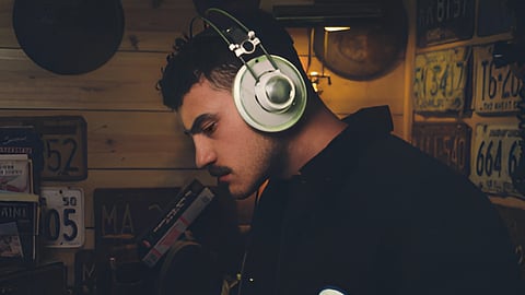 Music composer and producer Shiloh Rodriguez working in a studio environment