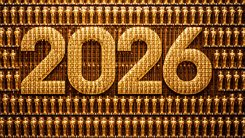 Gold “2026” display surrounded by rows of Oscar statuettes at the Academy Awards stage