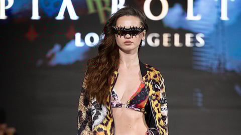 Model wears leopard print set on runway at The Majestic Downtown