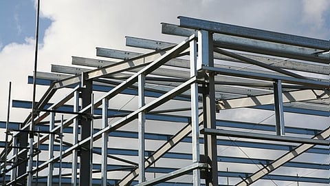 Steel frame structure under construction for expandable commercial building