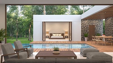 Modern villa with pool, outdoor seating, and bedroom view in a tropical setting
