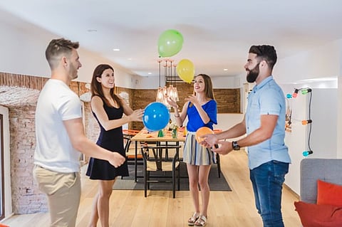 Friends enjoying a sports watch party at home