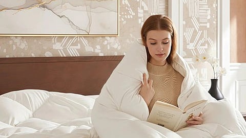 A white feathered comforter