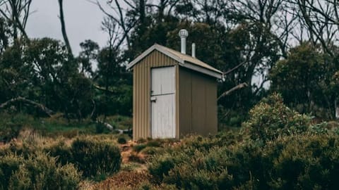 A rustic outdoor toilet