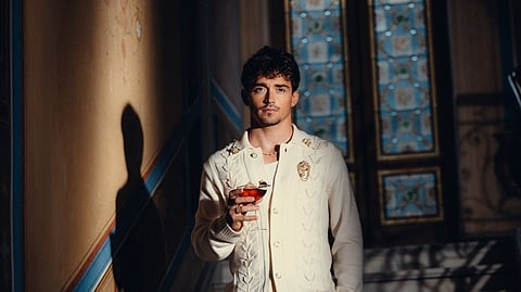 Charles Leclerc with Chivas Regal 16 cocktail in ornate interior setting