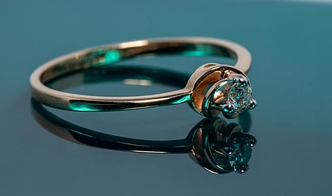 a rose gold solitaire engagement ring