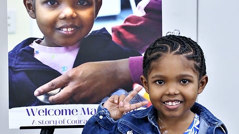 Young attendee poses during Heartbeats for PATCHES Game Day in Pinecrest