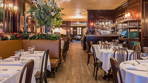 Elegant dining room at La Goulue prepared for Alex Donner cabaret